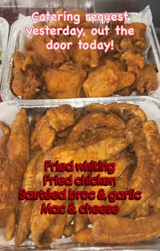 Trays of fried whiting and fried chicken packed for a catering order at Brother's Seafood